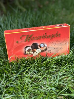 Цукерки Schluckwerder Mozartkugeln фісташковий марципан в шоколаді 200г, Німеччина id_9138 фото
