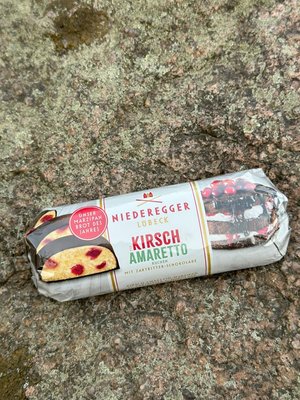 Марципановий батончик Niederegger Kirsch Amaretto вишневий амаретто в темному шоколаді 125г, Німеччина id_9144 фото