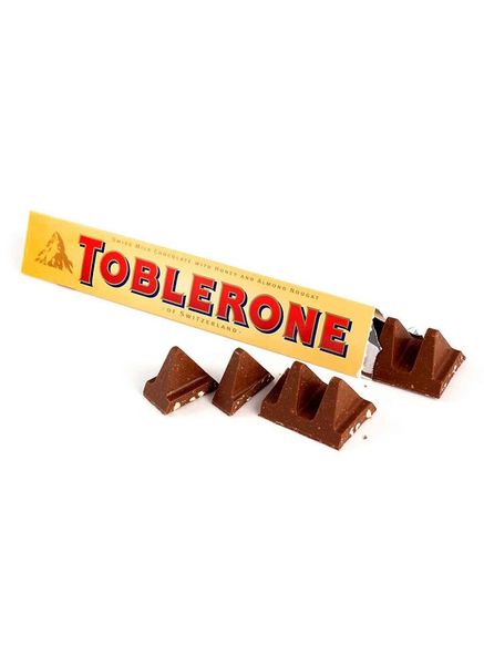 Швейцарський молочний шоколад Toblerone з медово-мигдальною нугою 100г id_1653 фото