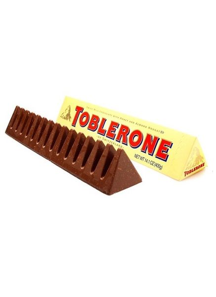 Швейцарський молочний шоколад Toblerone з медово-мигдальною нугою 100г id_1653 фото